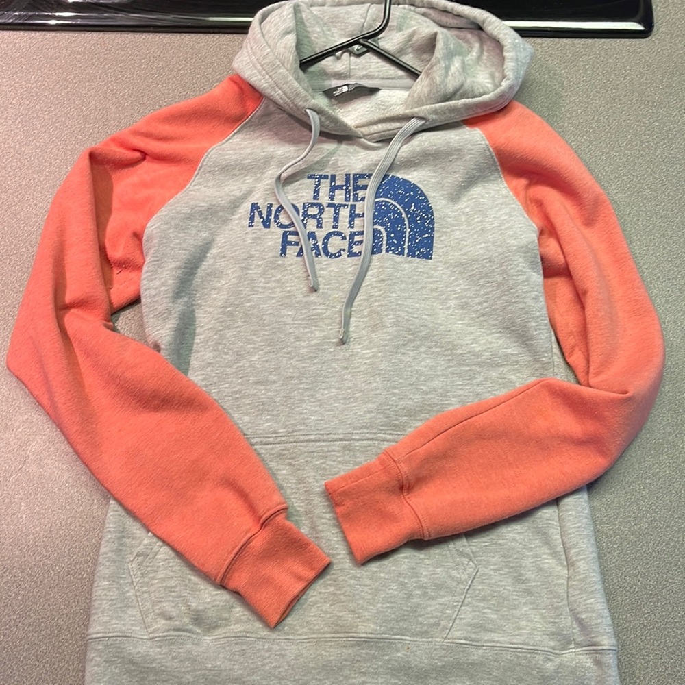 The North Face women’s sweatshirt, size small.